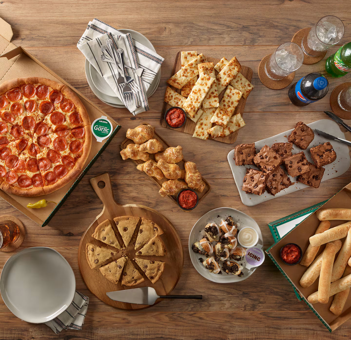 Papa Johns pizza ingredients and food spread